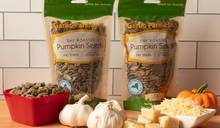 Load image into Gallery viewer, Garlic Parmesan No-Shell Pumpkin Seeds 12 Pak 6 oz bags
